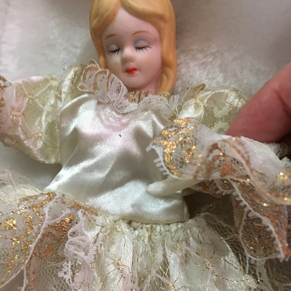 Elegant Porcelain Doll in Cream and Gold Dress - Picture 2 of 5